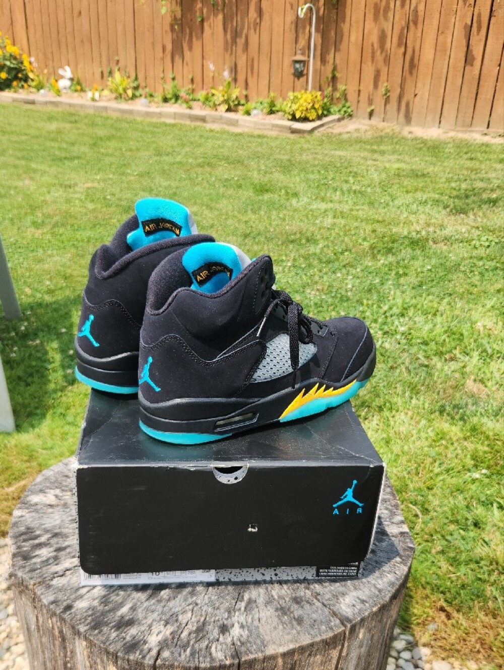 Jordan Retro 5 Sneakers in Black with Teal and Yellow Accents - Picture 3 of 6